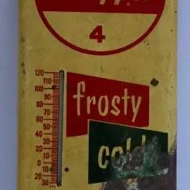 Vintage Dr Pepper "10 2 4" tin thermometer sign featuring "frosty cold" advertising graphics, showing significant...