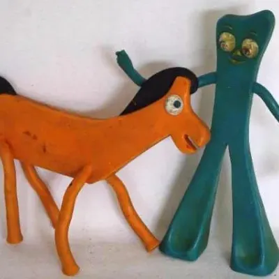 Vintage Gumby and Pokey bendable toy figures showing light paint wear and surface discoloration from age.