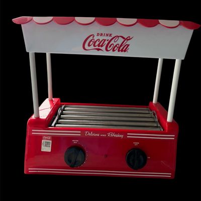 Sale Photo Thumbnail #3: Nostalgia Coca-Cola hot dog roller and bun warmer featuring a vintage-style red and white awning and dual control dials.