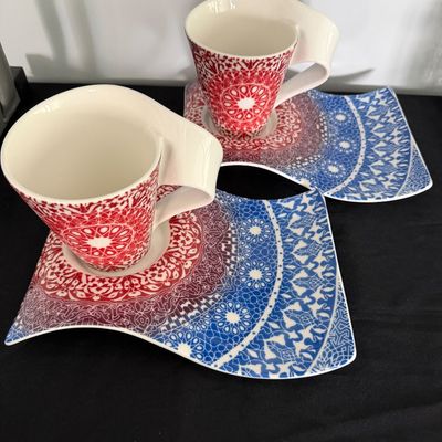 Sale Photo Thumbnail #17: Pair of Villeroy & Boch NewWave espresso cups and wave saucers featuring an intricate red and blue mandala pattern.