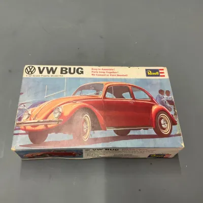 Sale Photo Thumbnail #250: Vintage Revell 1/32 scale plastic model kit of a VW Bug in original box showing light wear.