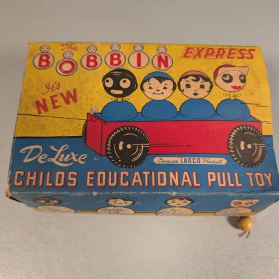 Sale Photo Thumbnail #361: Vintage 'The Bobbin Express' Deluxe child's educational wooden pull toy by Lagco in original box.