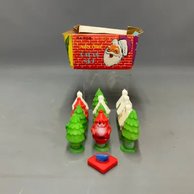 Sale Photo Thumbnail #399: Vintage mid-century plastic candy-filled Christmas figurines with original display box, including Santa Claus, snow-capped houses, and Christmas trees.