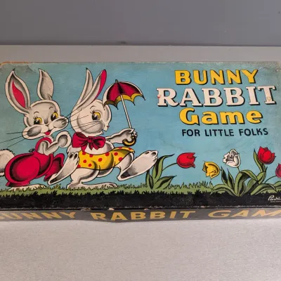 Sale Photo Thumbnail #182: Vintage Bunny Rabbit Game for Little Folks by Parker Brothers, featuring colorful illustrated box lid art.