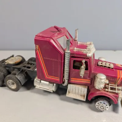 Sale Photo Thumbnail #337: Vintage 1980s Transformers G1 Motorarm / Motormaster semi-truck cab toy in played-with condition.