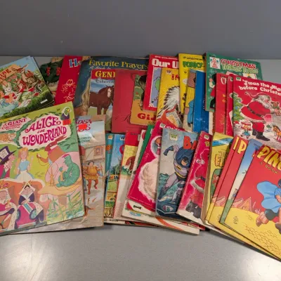Sale Photo Thumbnail #344: Collection of vintage coloring and activity books from the mid-20th century, including Disney, Batman, and holiday themes.
