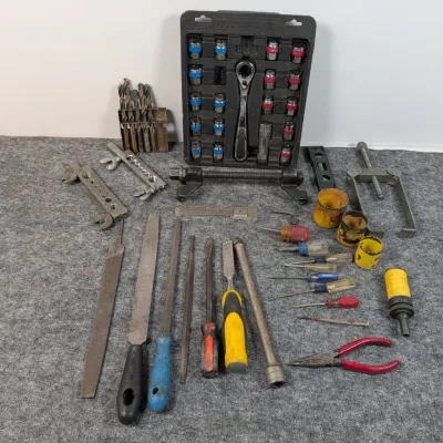 Sale Photo Thumbnail #88: Assorted mechanic and hand tool lot including a Pittsburgh socket set, drill bits, files, screwdrivers, hole saws, and flaring tools.