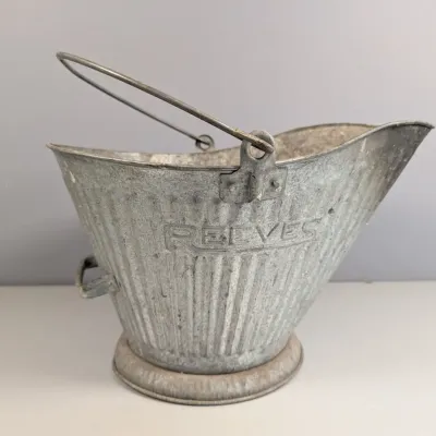 Sale Photo Thumbnail #327: Vintage Reeves corrugated galvanized metal coal scuttle bucket with wire bail handle.