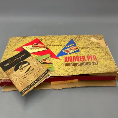 Sale Photo Thumbnail #208: Vintage Wonder Pen Woodburning Set in original box with instruction booklet, produced by American Toy & Furniture Co., circa 1950s.
