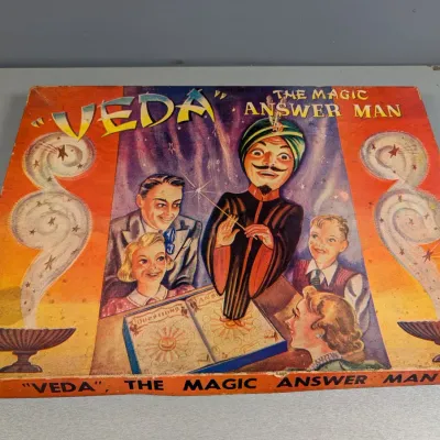 Sale Photo Thumbnail #184: Vintage 'Veda, The Magic Answer Man' novelty game in its original colorful illustrated box, showing light edge wear.