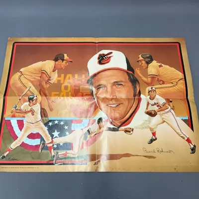 Sale Photo Thumbnail #100: Vintage 1983 Crown Central Petroleum promotional poster featuring Baltimore Orioles Hall of Famer Brooks Robinson, showing fold lines and minor edge wear.