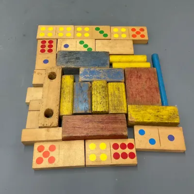 Sale Photo Thumbnail #257: Vintage collection of colorful wooden building blocks and large dominoes showing paint wear from use.