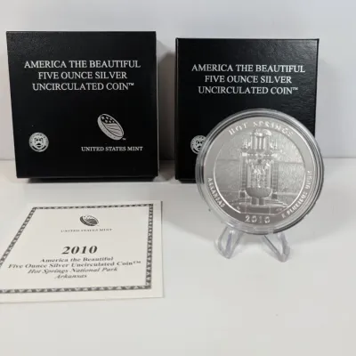 Sale Photo Thumbnail #7: 2010 Hot Springs National Park America the Beautiful five-ounce silver uncirculated coin with original US Mint display boxes and certificate of authenticity.