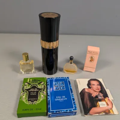 Sale Photo Thumbnail #142: Collection of vintage miniature perfume bottles and sample boxes, including Eau de Givenchy, Sisley Eau de Campagne, and White Shoulders.