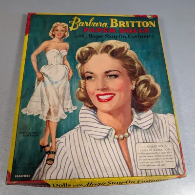 Sale Photo Thumbnail #195: Vintage Barbara Britton paper dolls set by Saalfield, featuring Magic Stay-On Costumes, circa 1950s.