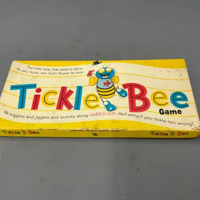 Sale Photo Thumbnail #221: Vintage Vintage 1950s Tickle Bee magnetic game by Schaper Plastic Games, featuring colorful illustrated box with minor edge wear.