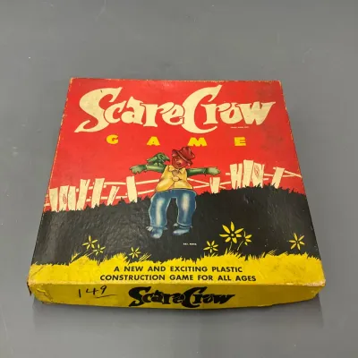 Sale Photo Thumbnail #110: Vintage Scarecrow Game box featuring colorful illustrated graphics and plastic construction theme, showing some edge wear.