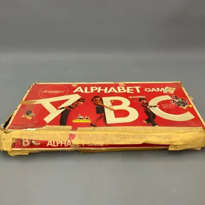 Sale Photo Thumbnail #205: Vintage Scrabble Brand Alphabet Game, featuring a heavily taped and worn original box.
