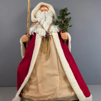 Sale Photo Thumbnail #149: Vintage Father Christmas figure dressed in a red velvet and faux-fur-trimmed cloak, holding a gold staff and a small pine tree.