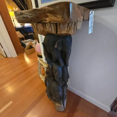 Sale Photo Thumbnail #100: Hand-carved wooden tall side table  composed of stacked elephant figures