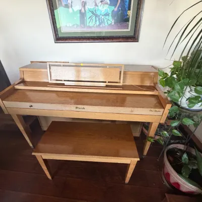 Mid-century modern Starck Ori-Coustic blonde wood spinet piano with matching bench.