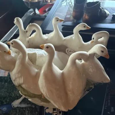 Vintage ceramic duck-themed centerpiece bowl featuring a ring of white ducks with orange beaks.