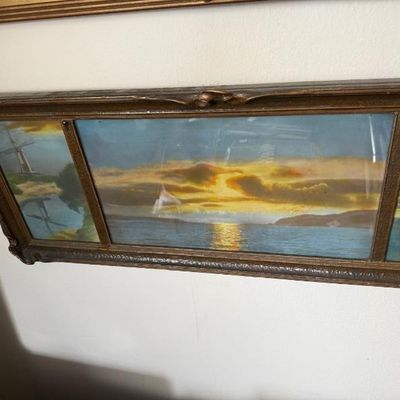 Sale Photo Thumbnail #74: Antique framed triptych print featuring landscape scenes, including a central sunset over water, housed in a decorative molded frame.