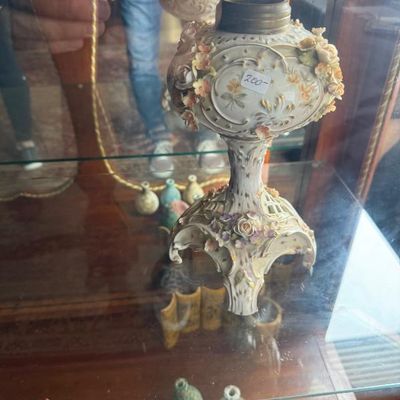 Sale Photo Thumbnail #282: Antique Dresden-style porcelain oil lamp base featuring applied floral embellishments and reticulated detailing.
