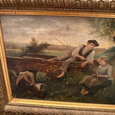 Sale Photo Thumbnail #50: Antique oil painting depicting a pastoral scene with figures near a stone bridge, housed in an ornate carved gesso and gilt frame.