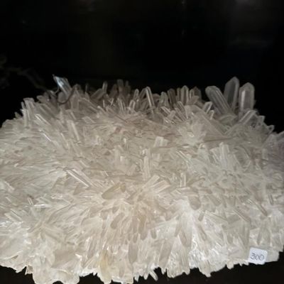 Sale Photo Thumbnail #131: Large clear quartz crystal cluster specimen featuring numerous elongated, pointed terminations.