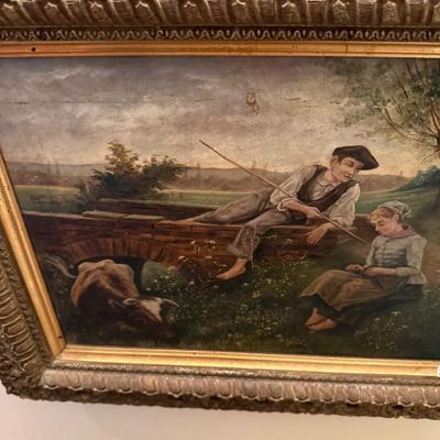 Sale Photo Thumbnail #61: Antique oil painting depicting a pastoral scene with a young man and woman near a stone bridge, housed in an ornate carved gesso and gilded frame.