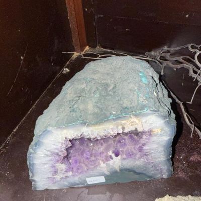Sale Photo Thumbnail #129: Large amethyst geode cathedral section displaying deep purple crystal points surrounded by a band of agate.
