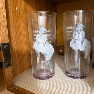 Sale Photo Thumbnail #170: Pair of vintage Marilyn Monroe highball glasses featuring her iconic white dress pose from The Seven Year Itch.