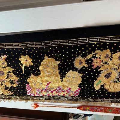 Sale Photo Thumbnail #272: Black velvet embroidered runner or wall hanging featuring intricate metallic gold zardozi-style floral motifs, sequins, and lace trim.