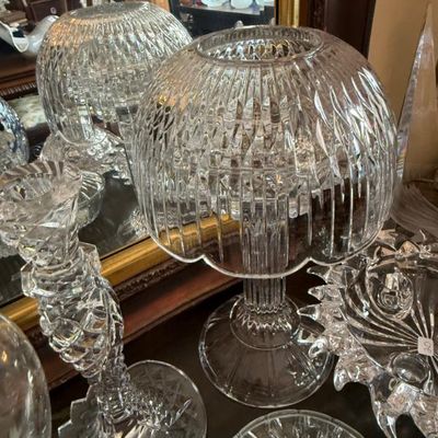 Sale Photo Thumbnail #340: Vintage cut glass fairy lamp with ribbed and diamond patterns, displayed alongside other decorative crystal and glassware.