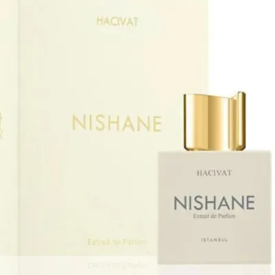Bottle of Nishane Hacivat Extrait de Parfum with its original cream and gold box.