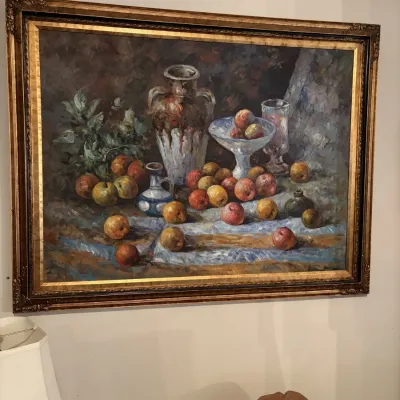 Sale Photo Thumbnail #49: Large impressionistic still life oil painting depicting fruit, vases, and glassware, set in an ornate gilded wooden frame.