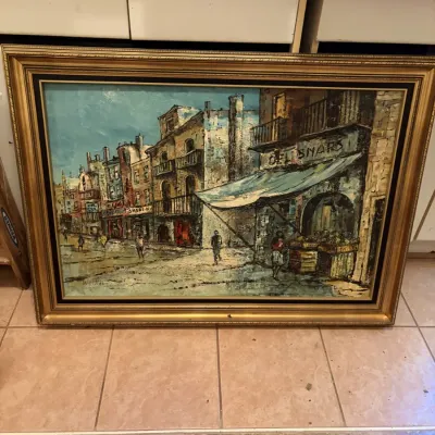 Sale Photo Thumbnail #114: Mid-century impasto oil painting depicting an urban European street scene with figures and storefronts, housed in a molded gilt wooden frame.