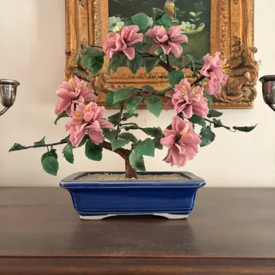 Sale Photo Thumbnail #5: Vintage Chinese glass glass and jade bonsai tree sculpture with pink blossoms set in a cobalt blue ceramic planter.