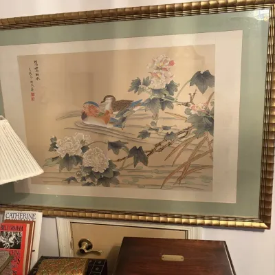 Sale Photo Thumbnail #86: Framed Asian watercolor artwork featuring mandarin ducks and peonies, set in a carved metallic frame under glass.