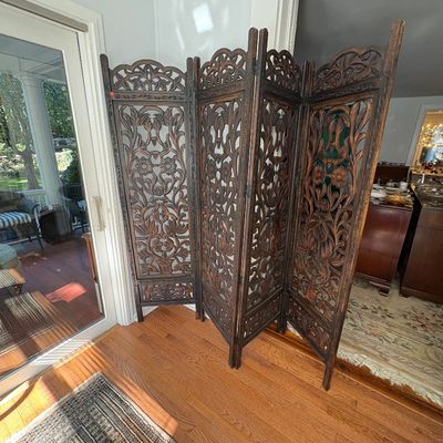 Sale Photo Thumbnail #38: Four-panel hand-carved dark wood room divider screen with intricate floral pierced details, Anglo-Indian style.