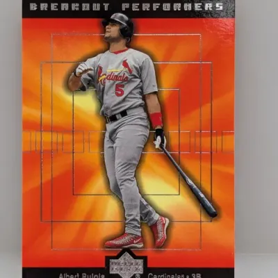 Upper Deck "Breakout Performers" Albert Pujols baseball card featuring him in a St. Louis Cardinals uniform, in good condition.