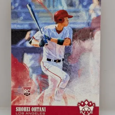 2018 Panini Diamond Kings Shohei Ohtani rookie baseball card, featuring canvas-textured artwork of Ohtani at bat in a Los Angeles Angels...