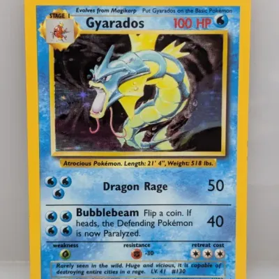 Vintage 1999 Pokémon Base Set holographic Gyarados trading card (6/102), illustrated by Mitsuhiro Arita.