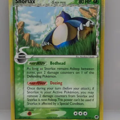 Snorlax Delta Species holographic Pokémon trading card from the EX Dragon Frontiers set, dated 2006.