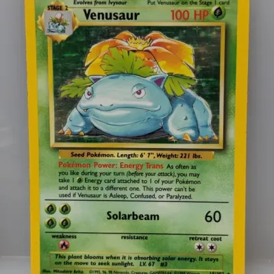 1999 Pokémon Base Set Holofoil Venusaur trading card, #15/102, featuring artwork by Mitsuhiro Arita.