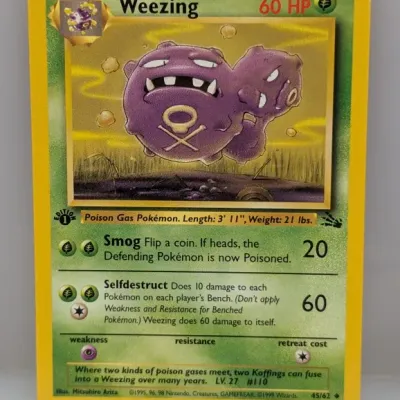 Pokemon Fossil set 1st Edition Weezing card, #45/62, illustrated by Mitsuhiro Arita and published by Wizards of the Coast in 1999.