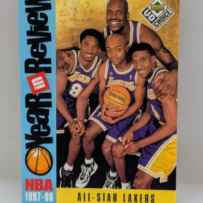1998-99 Upper Deck UD Choice "Year in Review" NBA basketball card featuring the 1997-98 All-Star Lakers: Kobe Bryant, Shaquille...