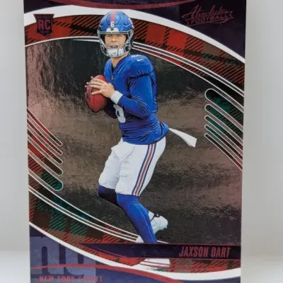 Jaxson Dart Panini Absolute Football rookie trading card in New York Giants uniform.