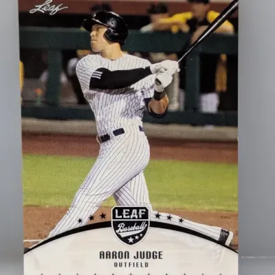 Leaf Baseball trading card featuring Aaron Judge, New York Yankees outfielder, shown mid-swing in his pinstripe uniform.